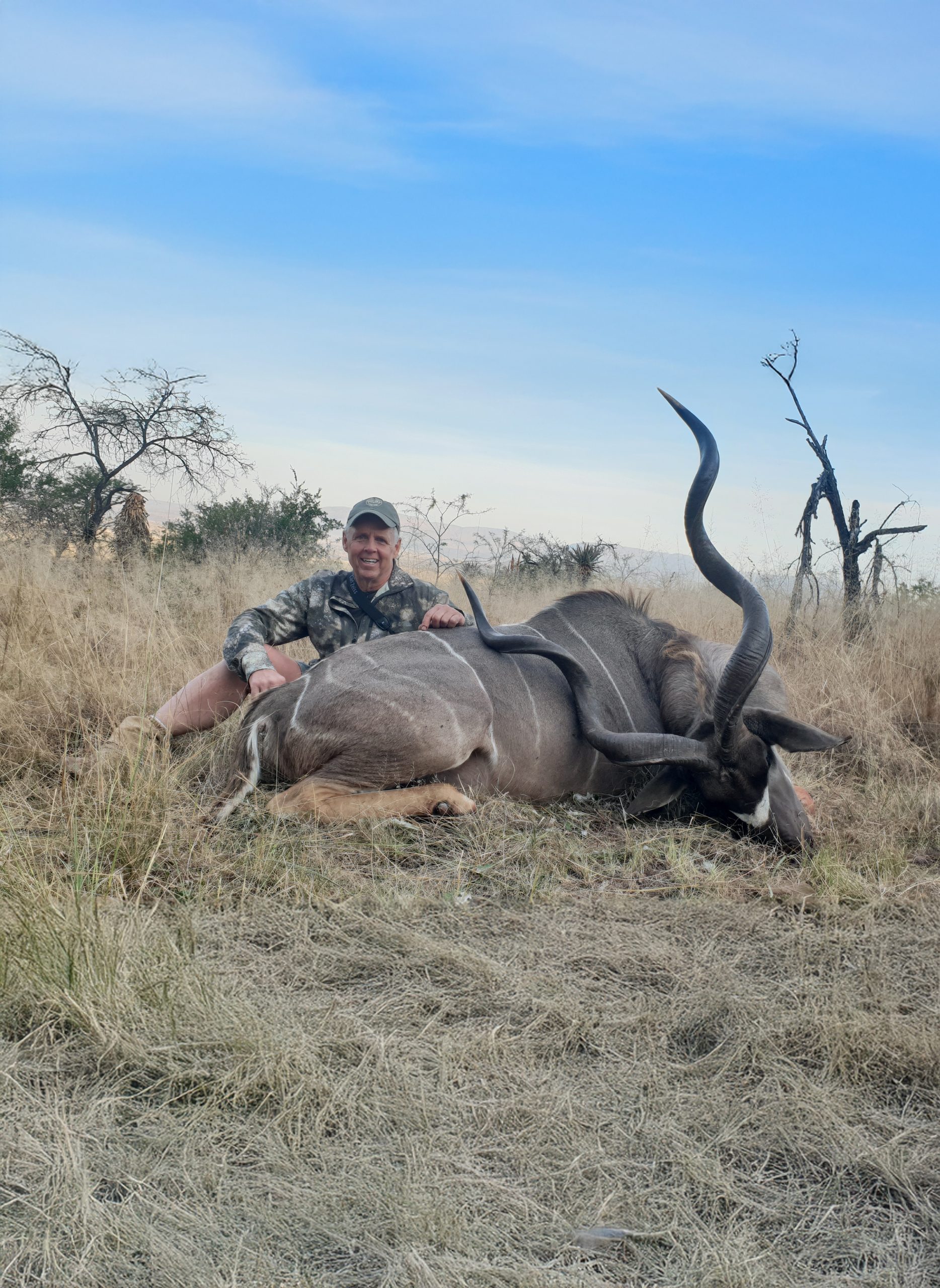 Hunter with Kudu during a South African spiral-horn safari
